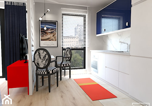 Mieszkanie na wynajem z widokiem na wrocławski Manhattan - Mała otwarta z salonem biała szara z zabudowaną lodówką z nablatowym zlewozmywakiem kuchnia jednorzędowa z oknem, styl nowoczesny - zdjęcie od Strzelecka Design