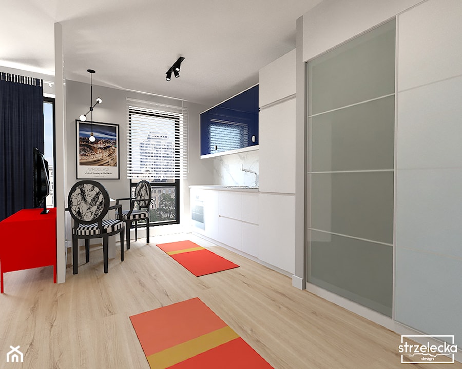 Mieszkanie na wynajem z widokiem na wrocławski Manhattan - Mała otwarta z salonem biała szara z zabudowaną lodówką z nablatowym zlewozmywakiem kuchnia jednorzędowa z oknem, styl nowoczesny - zdjęcie od Strzelecka Design