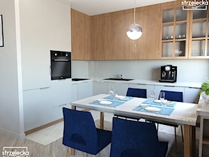 Salon z aneksem kuchennym - nowoczesna elegancja - Kuchnia, styl nowoczesny - zdjęcie od Strzelecka Design
