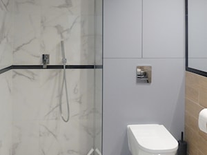 Nieduża i elegancka łazienka - zdjęcie od Katrilo Projektowanie wnętrz