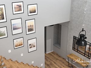 Schody z galerią zdjęć - zdjęcie od Aleksandra Tymińska Projektowanie Wnętrz