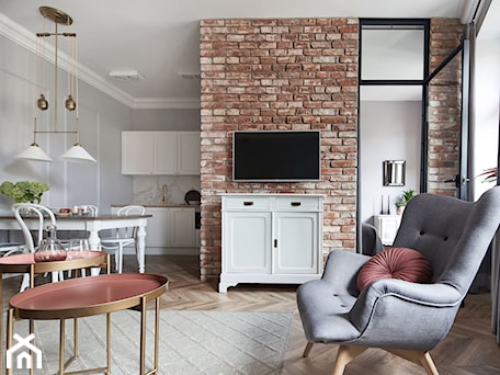 Aranżacje wnętrz - Salon: Apartament do wynajęcia z różowymi akcentami. - Mały szary salon z kuchnią z jadalnią, styl nowoczesny - double look design. Przeglądaj, dodawaj i zapisuj najlepsze zdjęcia, pomysły i inspiracje designerskie. W bazie mamy już prawie milion fotografii!