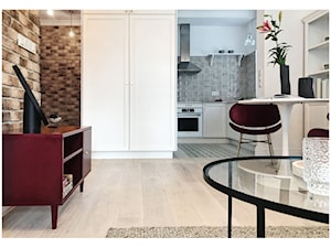 Apartament Grzybowska II - Mały biały salon z kuchnią, styl skandynawski - zdjęcie od LÄTT Studio Wnętrz