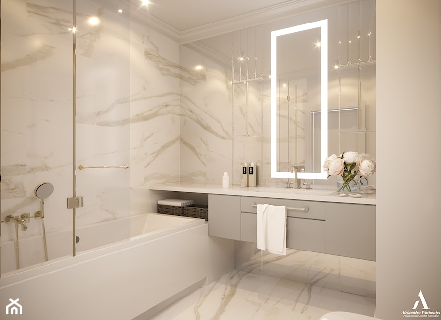 Ponadczasowa łazienka z płytkami z wzorem calacatta. - zdjęcie od Aleksandra Wachowicz Architektura Wnętrz