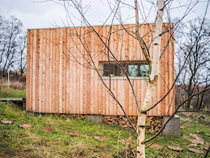 Dom z klocków - Małe parterowe domy drewniane, styl minimalistyczny - zdjęcie od architektura szyta na miarę
