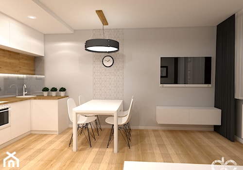 Mieszkanie 57 m2 Warszawa Targówek - Średnia szara jadalnia w salonie w kuchni - zdjęcie od dc creative design