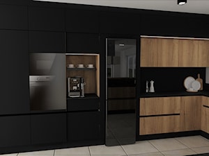 kuchnia 45 - Średnia otwarta z salonem biała czarna z zabudowaną lodówką z nablatowym zlewozmywakiem kuchnia w kształcie litery u z oknem z kompozytem na ścianie nad blatem kuchennym, styl nowoczesny - zdjęcie od projekt ka
