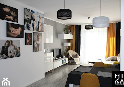 Mieszkanie nowoczesne - Mały szary salon z jadalnią, styl nowoczesny - zdjęcie od MIKA Studio Projektowe