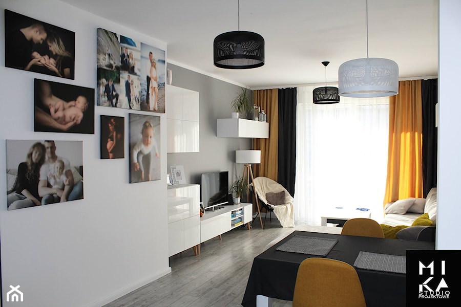 Mieszkanie nowoczesne - Mały szary salon z jadalnią, styl nowoczesny - zdjęcie od MIKA Studio Projektowe