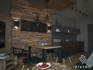 APARTAMENT Z MOCNYM DREWNIANYM AKCENTEM - Średnia szara jadalnia w salonie w kuchni - zdjęcie od VIVINO Studio