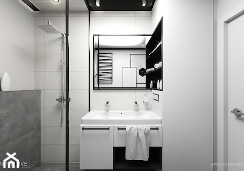 MIESZKANIE 70m2 w Łodzi - Mała na poddaszu bez okna z lustrem z dwoma umywalkami łazienka, styl minimalistyczny - zdjęcie od INVENTIVE studio