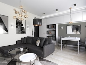 MIESZKANIE 70m2 w Łodzi - Średni biały szary salon z jadalnią z bibiloteczką, styl minimalistyczny - zdjęcie od INVENTIVE studio