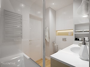 MIESZKANIE DWUPOZIOMOWE z miętowym akcentem - Mała bez okna z punktowym oświetleniem łazienka, styl skandynawski - zdjęcie od INVENTIVE studio