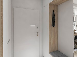 MĘSKI PUNKT WIDZENIA - Mały z wieszakiem biały hol / przedpokój, styl minimalistyczny - zdjęcie od INVENTIVE studio