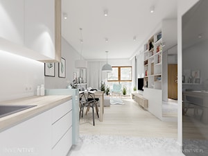 pasteLOVE - Mała otwarta biała z zabudowaną lodówką z nablatowym zlewozmywakiem kuchnia w kształcie ... - zdjęcie od INVENTIVE studio