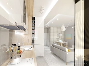 GEOMETRYCZNIE z pastelową nutą - Mała otwarta z salonem szara z zabudowaną lodówką z nablatowym zlewozmywakiem kuchnia w kształcie litery l, styl nowoczesny - zdjęcie od INVENTIVE studio
