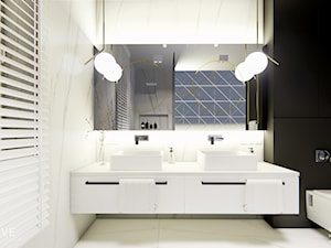 MAKÓW MAZOWIECKI - Średnia z lustrem z dwoma umywalkami z marmurową podłogą z punktowym oświetleniem ... - zdjęcie od INVENTIVE studio