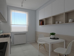 MIESZKANIE LUBIN - Duża zamknięta biała z zabudowaną lodówką z nablatowym zlewozmywakiem kuchnia dwurzędowa z oknem - zdjęcie od SPATIO Projektowanie Wnętrz
