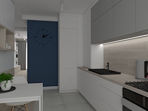 MIESZKANIE LUBIN - Średnia otwarta biała z zabudowaną lodówką z nablatowym zlewozmywakiem kuchnia jednorzędowa - zdjęcie od SPATIO Projektowanie Wnętrz