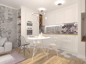 MIESZKANIE MŁODEJ KOBIETY - Średnia otwarta z salonem biała szara z zabudowaną lodówką z podblatowym zlewozmywakiem kuchnia w kształcie litery l z marmurem nad blatem kuchennym, styl glamour - zdjęcie od MANUKA pracownia projektowa
