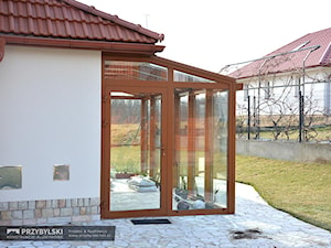 Ogród zimowy z tyłu domu - zdjęcie od Przybylski Ogrody Zimowe & Konstrukcje aluminiowo-szklane