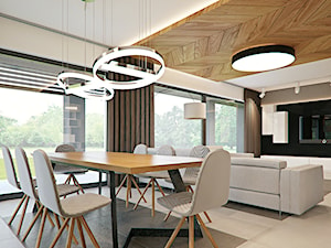 Duża beżowa brązowa jadalnia w salonie, styl nowoczesny - zdjęcie od SzklarczykDesign