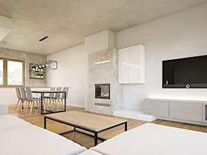 002 - Średni szary salon z kuchnią z jadalnią, styl industrialny - zdjęcie od SzklarczykDesign