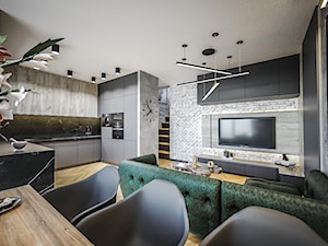 Salon - Średnia otwarta z salonem czarna z zabudowaną lodówką z nablatowym zlewozmywakiem kuchnia w kształcie litery u, styl industrialny - zdjęcie od Vimko Projektowanie Wnętrz