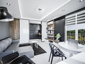Minimalistyczny salon - Duży czarny salon z kuchnią z jadalnią, styl minimalistyczny - zdjęcie od Vimko Projektowanie Wnętrz