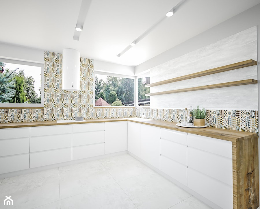 Przestronna biała kuchnia - Duża otwarta szara z zabudowaną lodówką z nablatowym zlewozmywakiem kuchnia w kształcie litery l z oknem, styl skandynawski - zdjęcie od Vimko Projektowanie Wnętrz