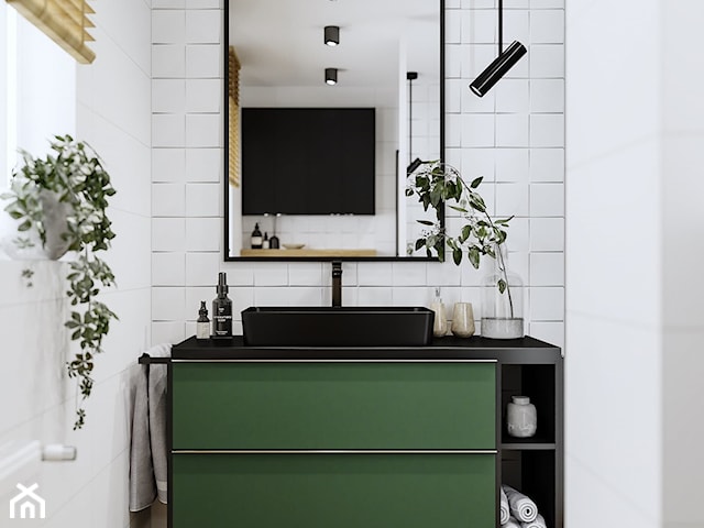 Aranżacja łazienki w mocnych kolorach czerni i zieleni