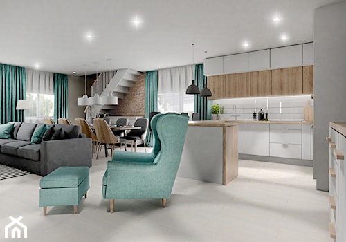 Duży salon z kuchnią i schodami na piętro oraz niebieskimi dodatkami - Średni czarny salon z kuchnią z jadalnią - zdjęcie od Projektowanie Wnetrz Online