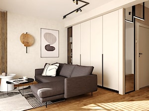Eleganckie mieszkanie w beżach, czerni i przydymionym drewnie - Salon, styl nowoczesny - zdjęcie od Projektowanie Wnetrz Online
