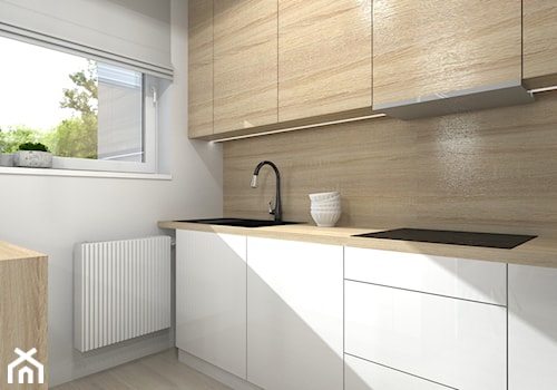 Aneks kuchenny w salonie - Średnia biała z zabudowaną lodówką z nablatowym zlewozmywakiem kuchnia dwurzędowa z oknem - zdjęcie od Projektowanie Wnetrz Online