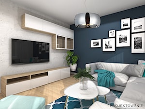 Projekt salonu z niebieską ścianą - Średni czarny szary salon - zdjęcie od Projektowanie Wnetrz Online