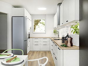 Kuchnia w domu - Średnia otwarta szara z zabudowaną lodówką z nablatowym zlewozmywakiem kuchnia w kształcie litery u z oknem - zdjęcie od Projektowanie Wnetrz Online