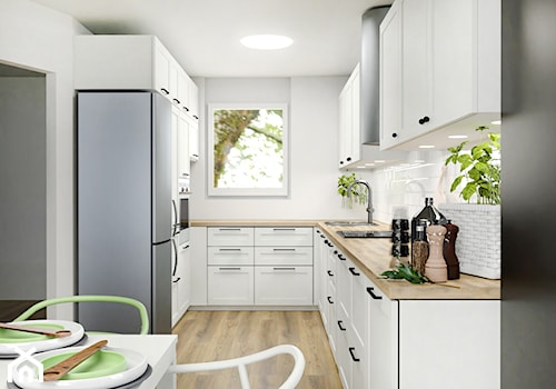 Kuchnia w domu - Średnia otwarta szara z zabudowaną lodówką z nablatowym zlewozmywakiem kuchnia w kształcie litery u z oknem - zdjęcie od Projektowanie Wnetrz Online