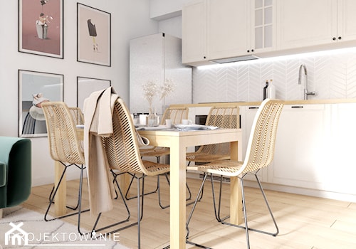 Projekt mieszkania z cegłą i drewnem - Mała otwarta biała z zabudowaną lodówką z lodówką wolnostojącą kuchnia jednorzędowa, styl nowoczesny - zdjęcie od Projektowanie Wnetrz Online