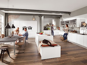 Jak urządzić kuchnię otwartą na salon? Stwórz przyjazną przestrzeń dla domowników i gości!