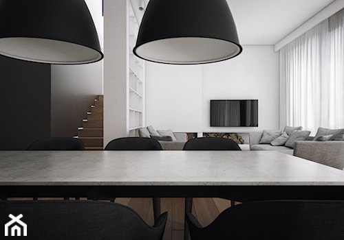 Wnętrza domu w Konstancinie - Średnia biała czarna jadalnia w salonie, styl skandynawski - zdjęcie od Ev Architects