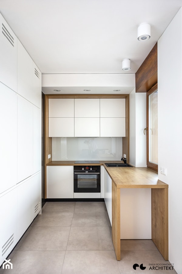 Mieszkanie dla 1 osoby // realizacja - Kuchnia, styl minimalistyczny - zdjęcie od Emilia Bogdanowicz ARCHITEKT