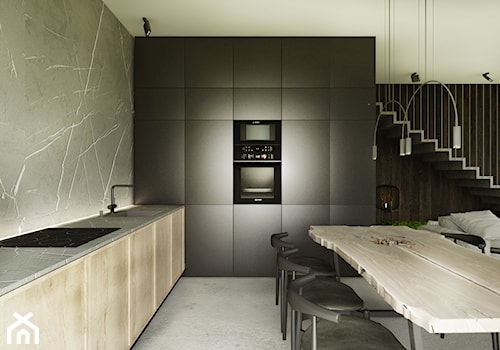 Projekt wnętrz / Białka Tatrzańska - Duża otwarta z salonem czarna z zabudowaną lodówką z podblatowym zlewozmywakiem kuchnia w kształcie litery l z marmurem nad blatem kuchennym, styl nowoczesny - zdjęcie od MUW studio