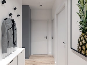 Mieszkanie na Odolanach - Średni z wieszakiem biały szary hol / przedpokój, styl skandynawski - zdjęcie od BDWstudio