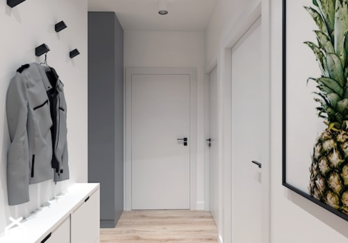 Mieszkanie na Odolanach - Średni z wieszakiem biały szary hol / przedpokój, styl skandynawski - zdjęcie od BDWstudio