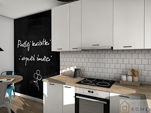 Wymarzona kuchnia - Mała otwarta czarna szara z zabudowaną lodówką kuchnia w kształcie litery l, styl nowoczesny - zdjęcie od Mieszkaj Komfortowo