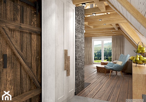 przepokój z aneksem kuchennym i klatką schodową na poddaszu drewnianego domku weekendwoego - zdjęcie od balhouse - projektowanie wnętrz