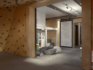 pomieszczenie ze ścianką wpsinaczkową i kącik zabaw dla dzieci w górskim pensjonacie - zdjęcie od balhouse - projektowanie wnętrz
