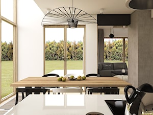 Dom w Pigwowcach - Średnia biała jadalnia w salonie w kuchni, styl nowoczesny - zdjęcie od Studio 23A