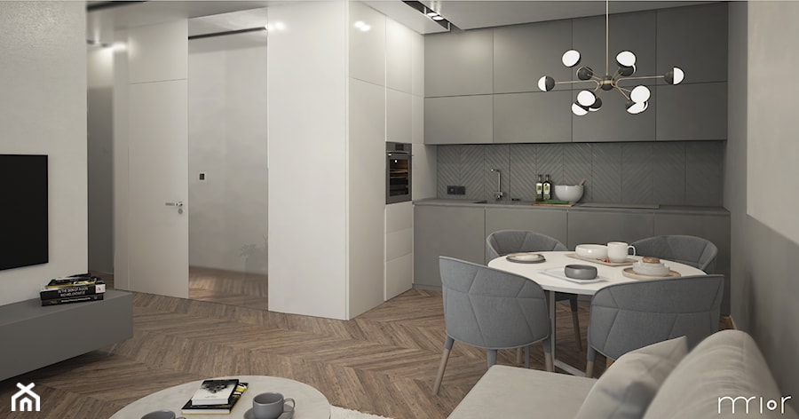 Mieszkanie 40 m2 - Średnia szara jadalnia w salonie w kuchni - zdjęcie od mrior