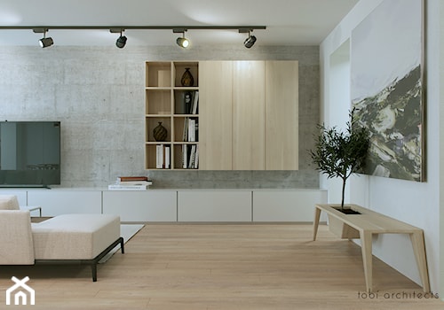 RENT ME - Duży biały salon z bibiloteczką, styl nowoczesny - zdjęcie od Tobi Architects